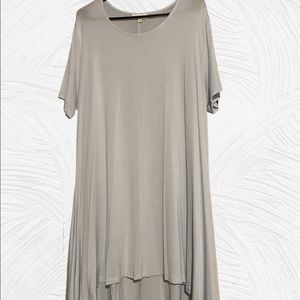 Comfy dress. The color is actually light blue. It’s thin, but not see through.